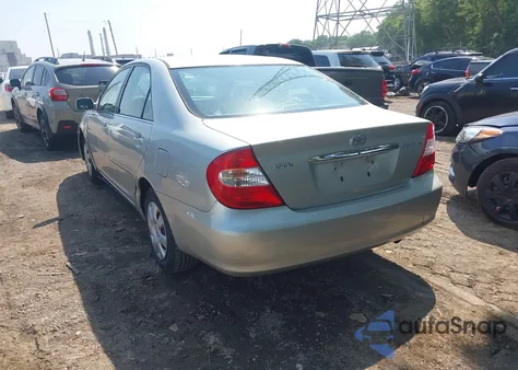2002 Toyota Camry Le из США, поврежденный, VIN JTDBE32K520115478